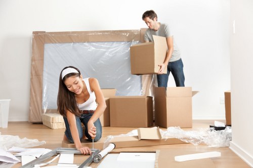 Removals team planning a move on a residential street in Crouch End