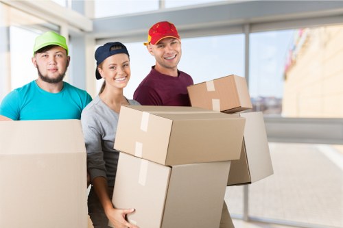 Local removals crew loading boxes and furniture for a Crouch End move